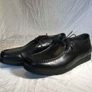 Black leather men shoes.